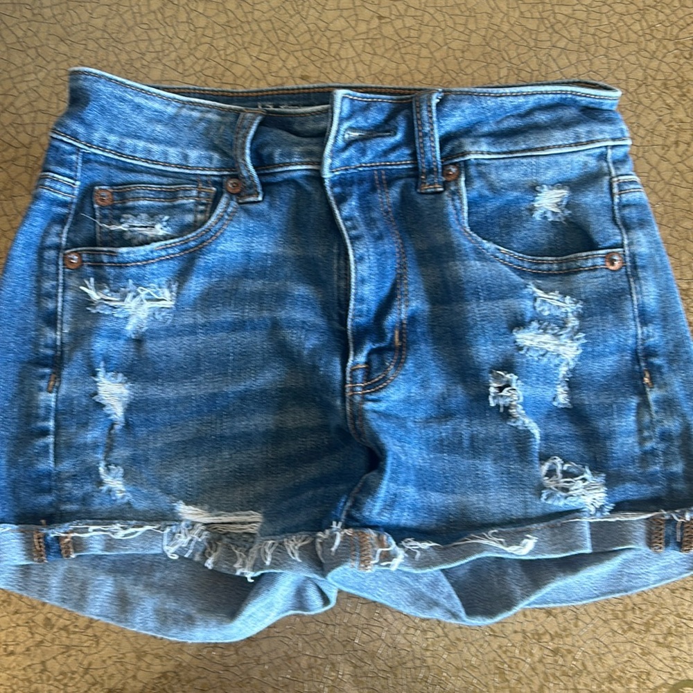 American Eagle shorts sz 0.  Cuffed leg openings. Distressed front.